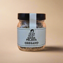 Load image into Gallery viewer, Jar of oregano with 'Mama Pelagia' label on a peach background
